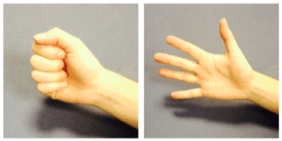 Person opening and closing their hand.